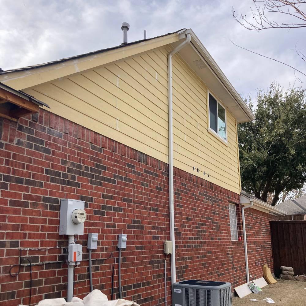 after-moulden-exterior-hardie-siding-replacement-rock-painting-and-gutters (2)